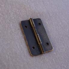 Small antique hinge